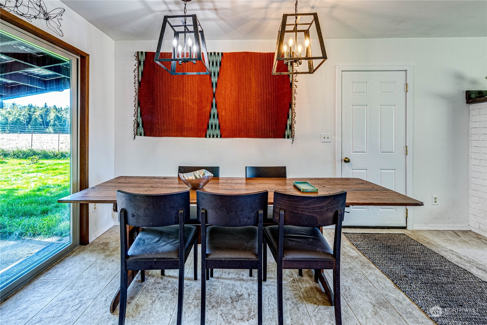 283 Schmitt Road Port Angeles, WA 98363 - Photo 15 of 40 a dining room with furniture and window