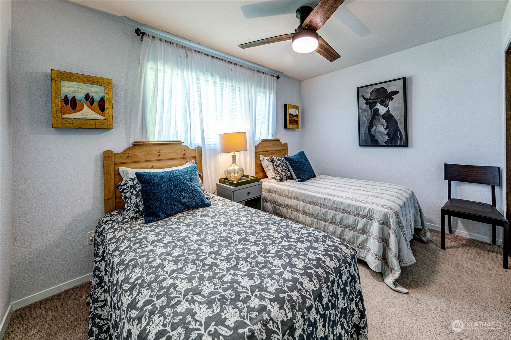 283 Schmitt Road Port Angeles, WA 98363 - Photo 20 of 40 a bedroom with bed and a window