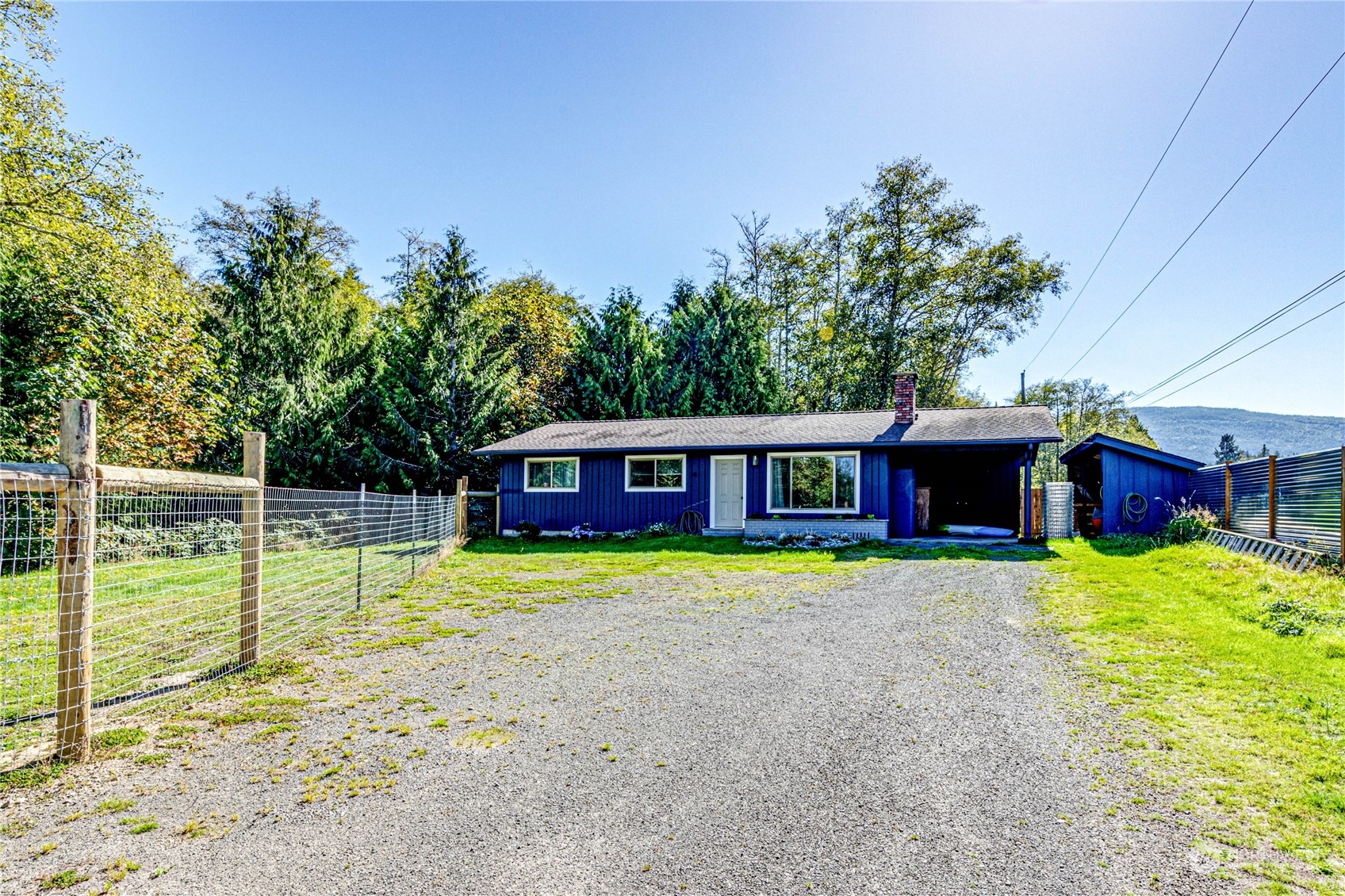 283 Schmitt Road Port Angeles, WA 98363 - Photo 2 of 40 a view of a house with a yard