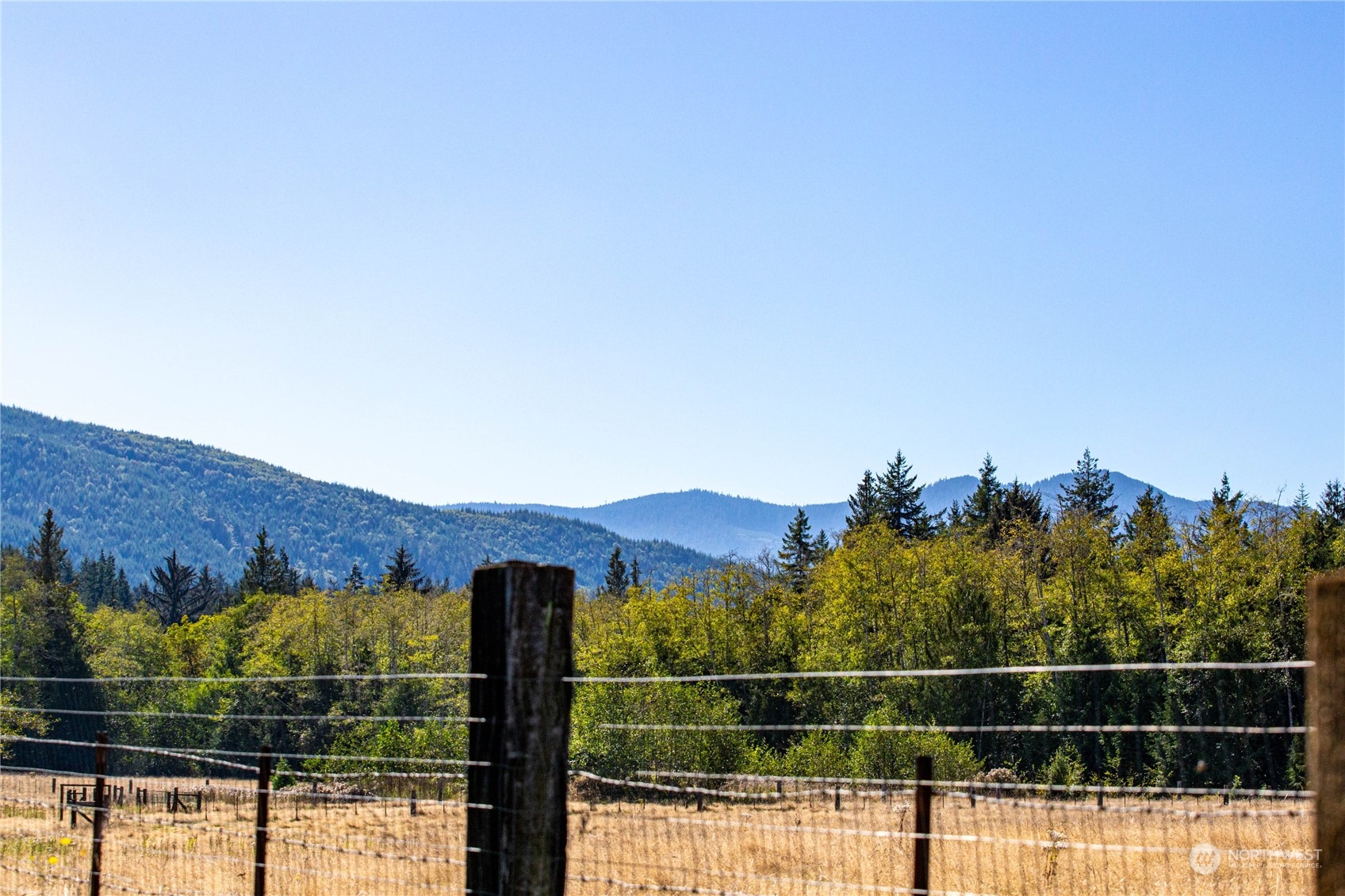 283 Schmitt Road Port Angeles, WA 98363 - Photo 29 of 40 a view of a fence and a mountain view