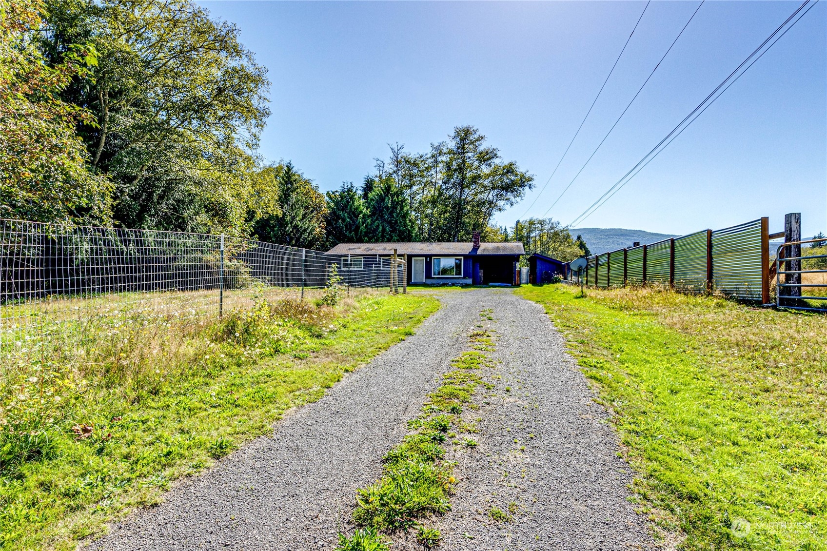 283 Schmitt Road Port Angeles, WA 98363 - Photo 40 of 40 a view of a swimming pool with a patio