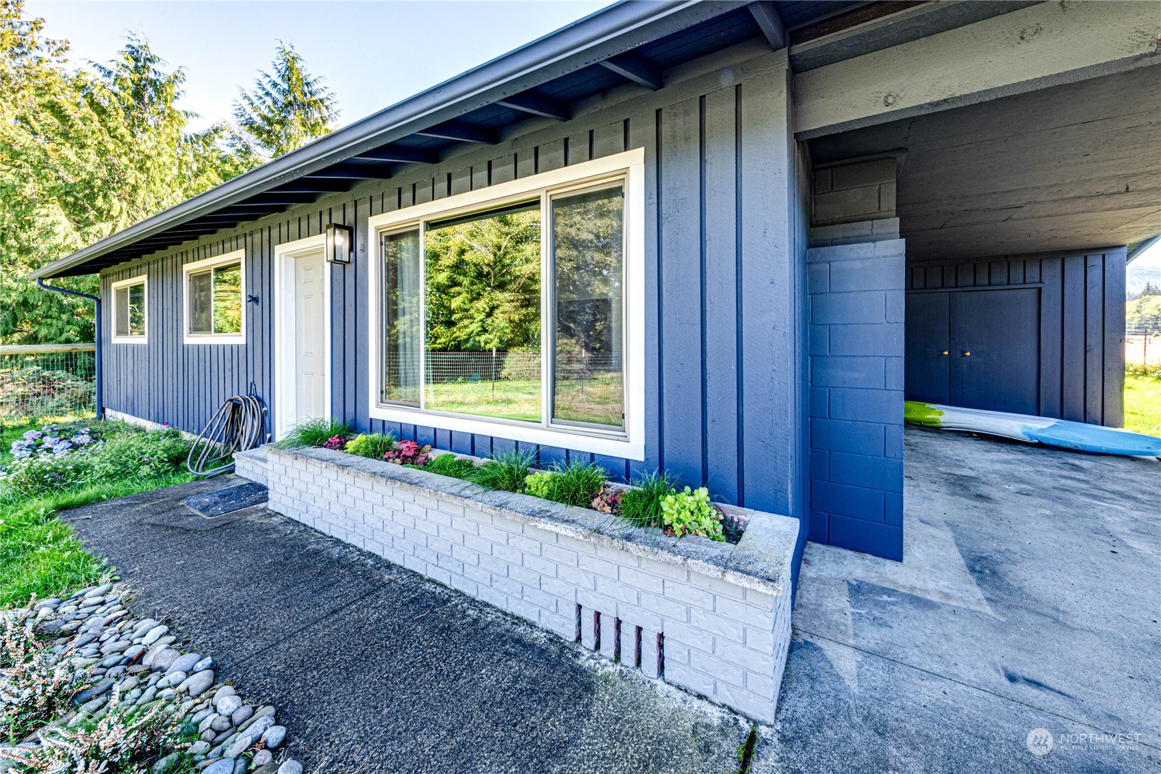 283 Schmitt Road Port Angeles, WA 98363 - Photo 4 of 40 a house view with a garden space