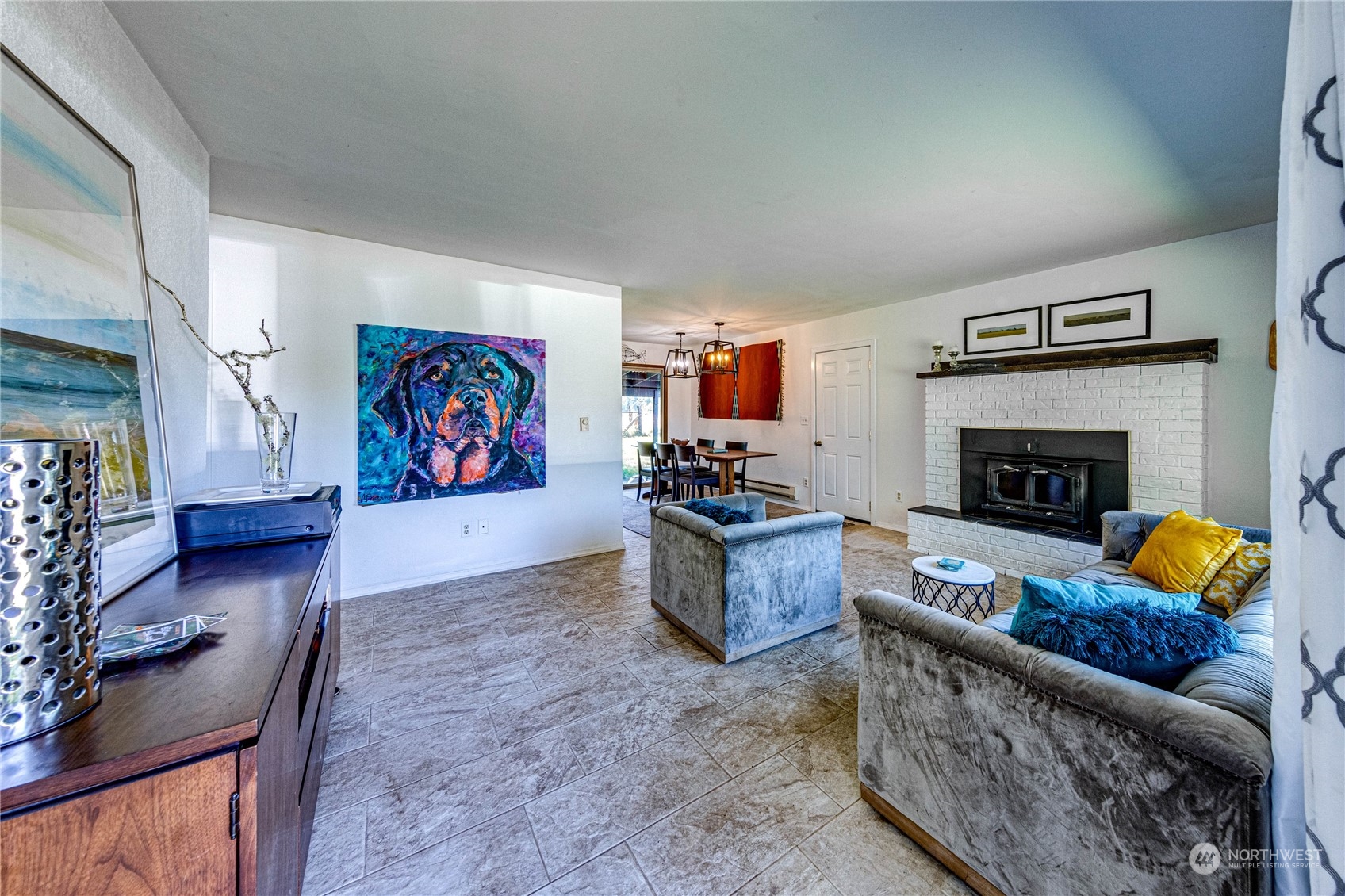 283 Schmitt Road Port Angeles, WA 98363 - Photo 6 of 40 a living room with furniture fireplace and rug