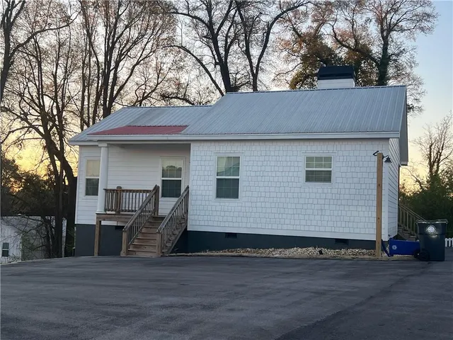 a view of a house with a patio