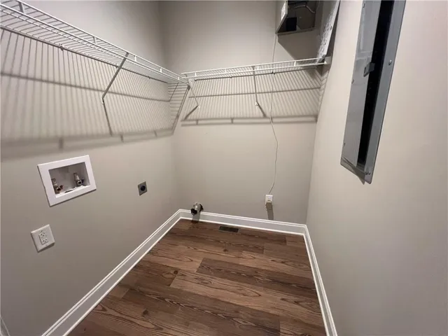 a view of a room with rack on the wall