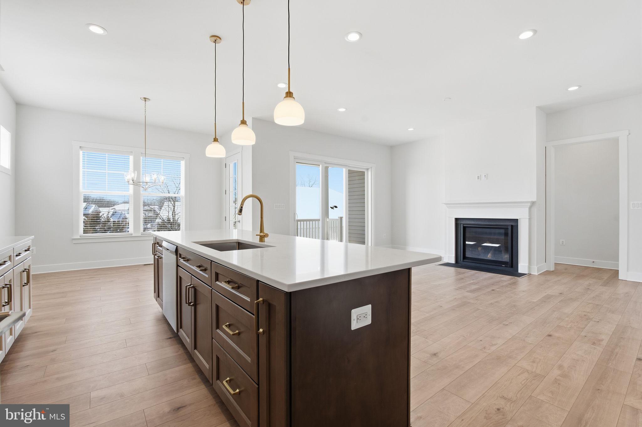 124 Bridge Valley Road Gettysburg, PA 17325 - Photo 14 of 34 a kitchen with stainless steel appliances a sink and a stove