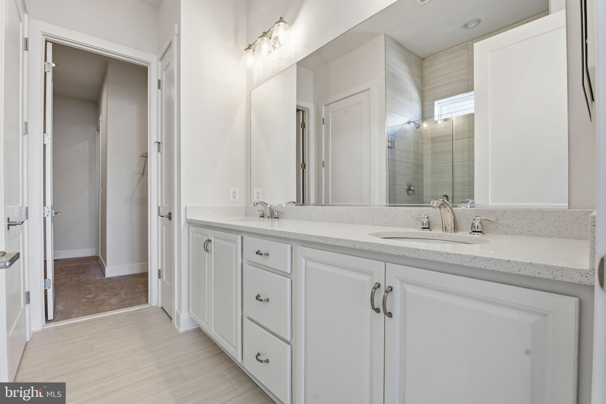 124 Bridge Valley Road Gettysburg, PA 17325 - Photo 18 of 34 a bathroom with double sink and a mirror