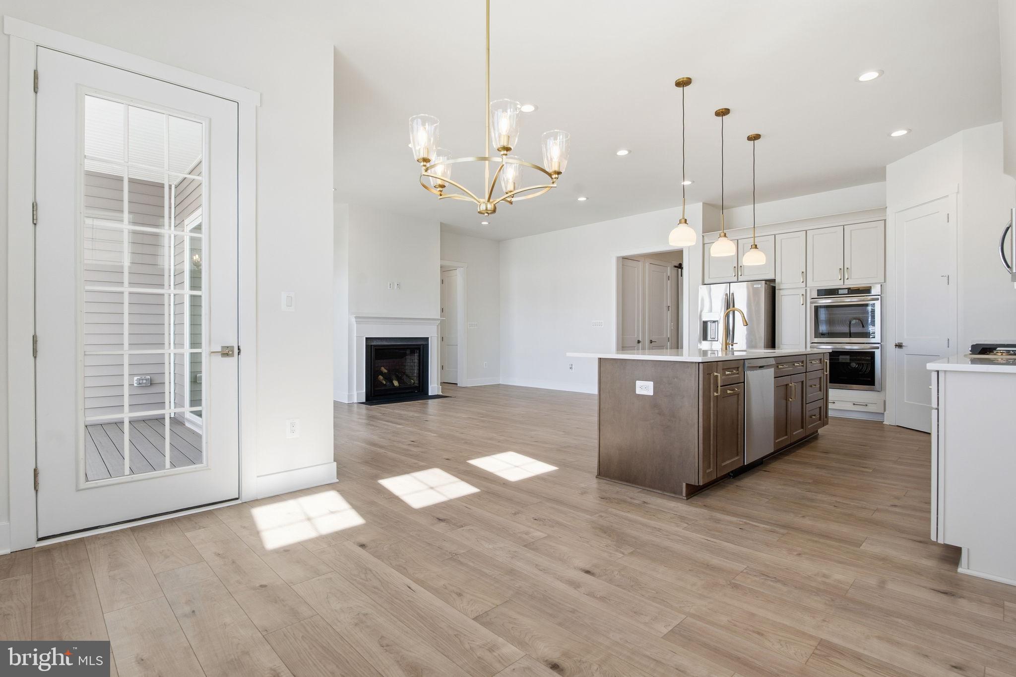 124 Bridge Valley Road Gettysburg, PA 17325 - Photo 9 of 34 a view of a kitchen with a sink cabinets and wooden floor