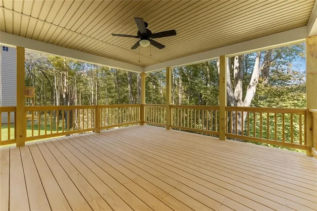 a view of a balcony with wooden floor