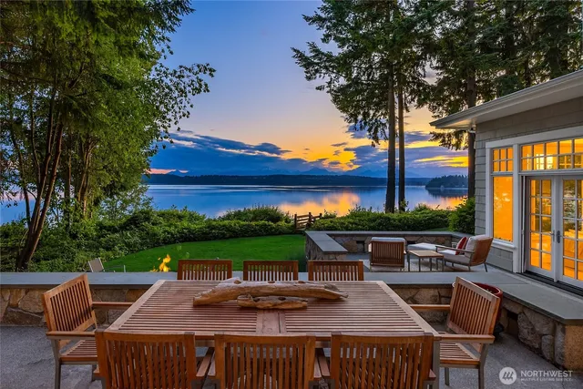 a view of a chairs and table in the patio