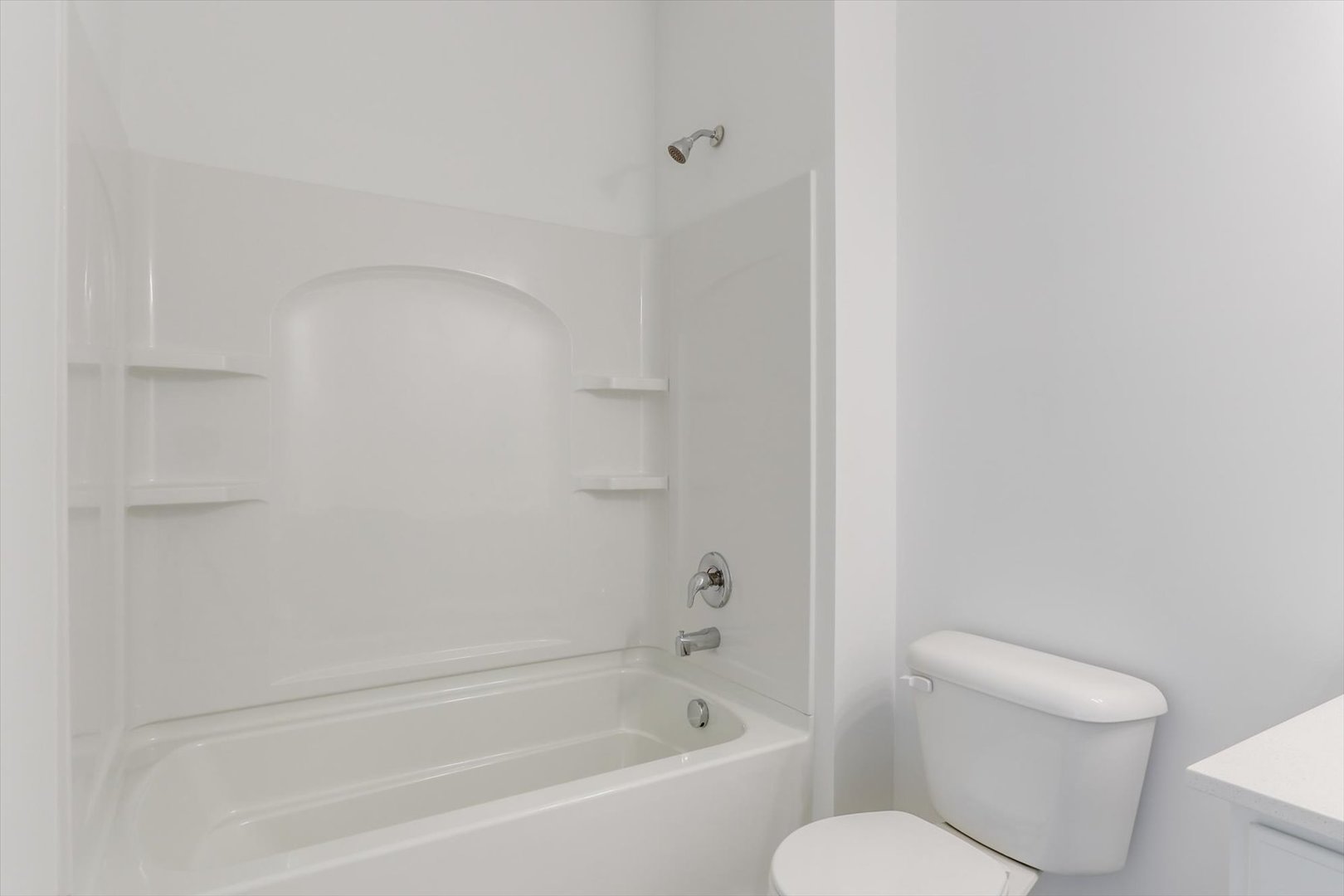 542 Comstock Road South Elgin, IL 60177 - Photo 30 of 32 a white bath tub sitting next to a white toilet
