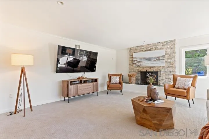 13311 Fallen Leaf Road Poway, CA 92064 - Photo 5 of 30 a living room with furniture and a flat screen tv