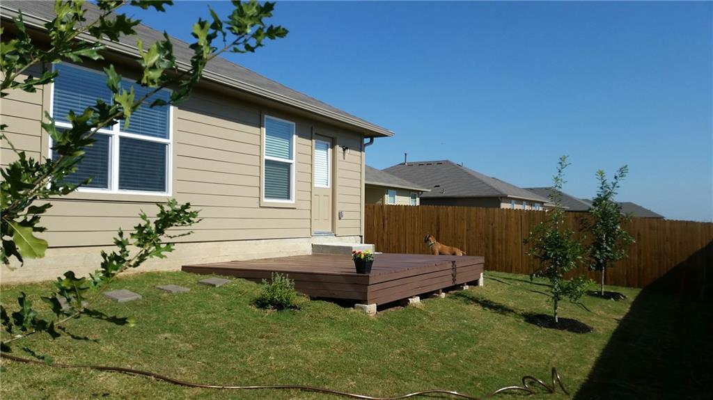 185 Voss Kyle, TX 78640 - Photo 24 of 26 a view of backyard with a garden and plants
