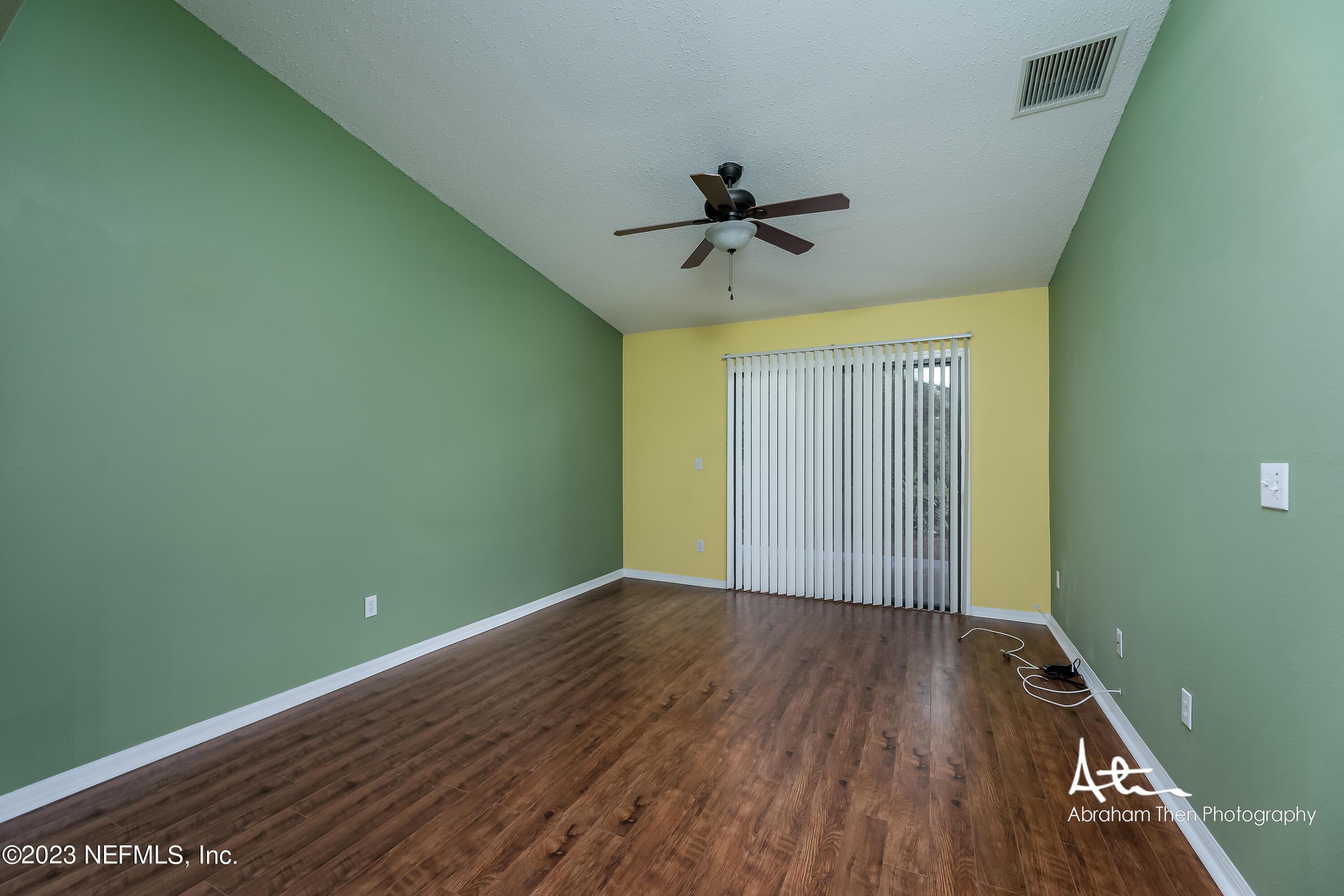 742 Ginger Mill Drive St. Johns, FL 32259 - Photo 13 of 32 a view of room with window ceiling fan and hardwood floor