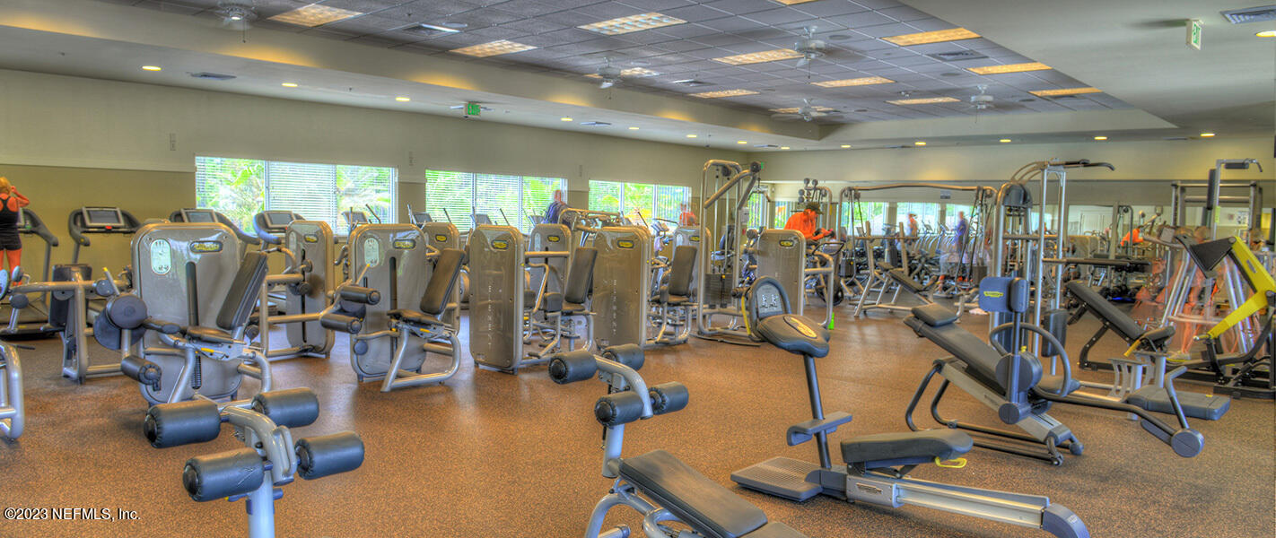 742 Ginger Mill Drive St. Johns, FL 32259 - Photo 30 of 32 a view of a room with gym equipment