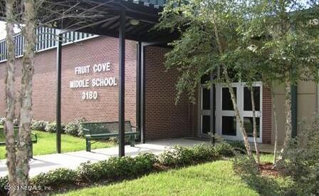 742 Ginger Mill Drive St. Johns, FL 32259 - Photo 32 of 32 a view of a sign board with a yard