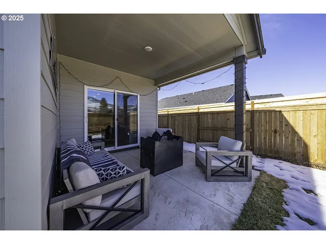 a view of a couch in the balcony