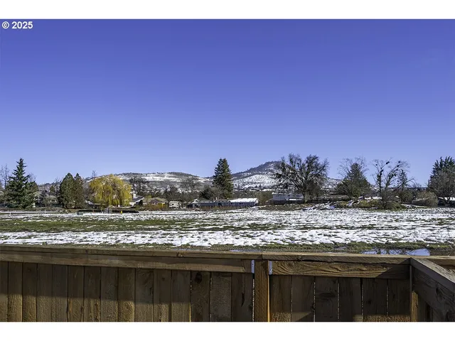 a view of house and yard