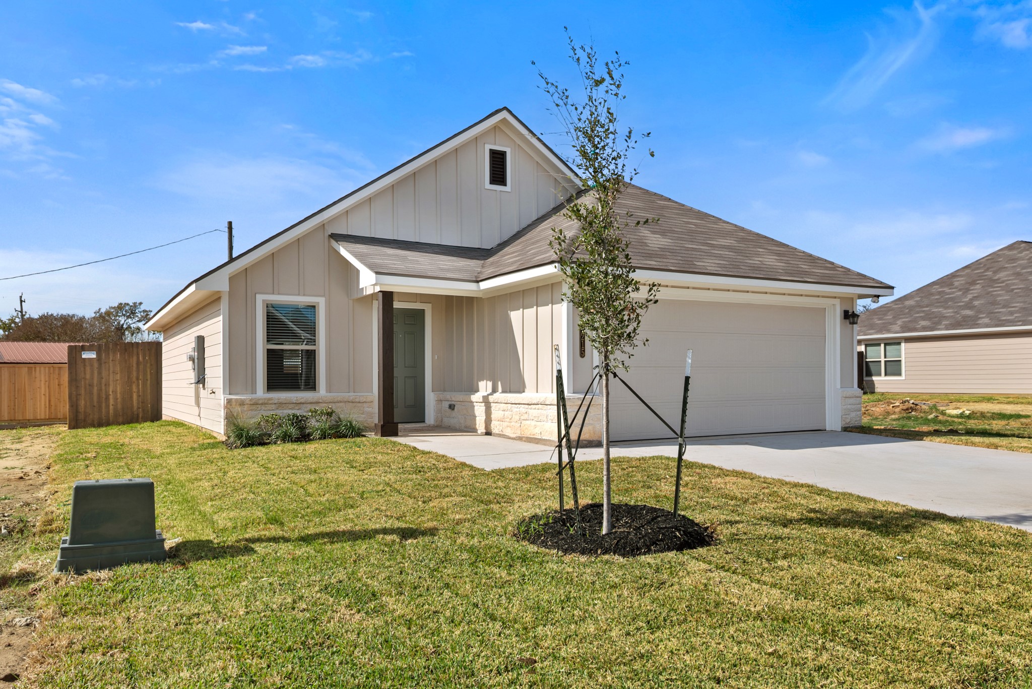 1215 High Street Navasota, TX 77868 - Photo 2 of 23 a front view of a house with a yard