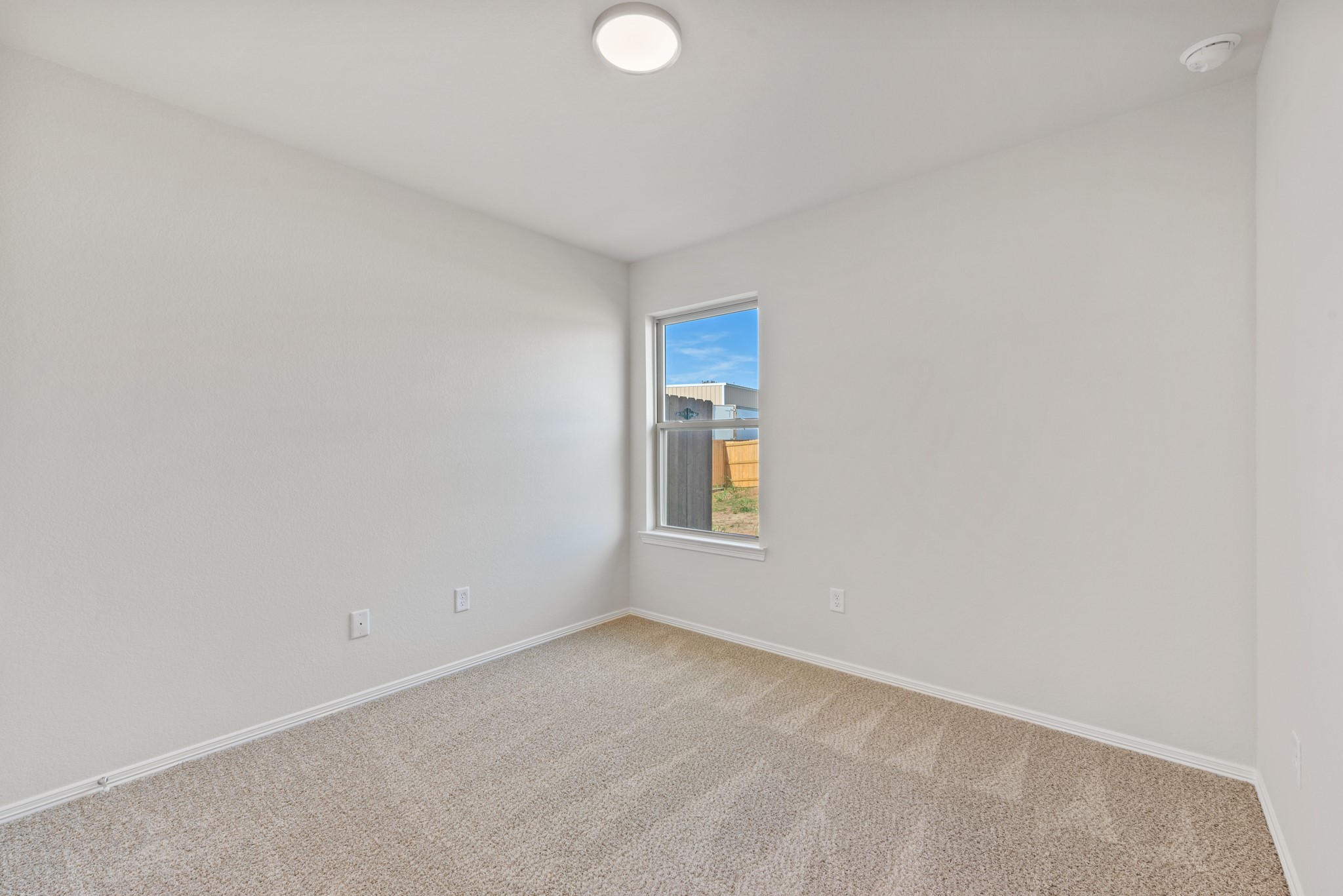 1215 High Street Navasota, TX 77868 - Photo 21 of 23 a view of an empty room with a window