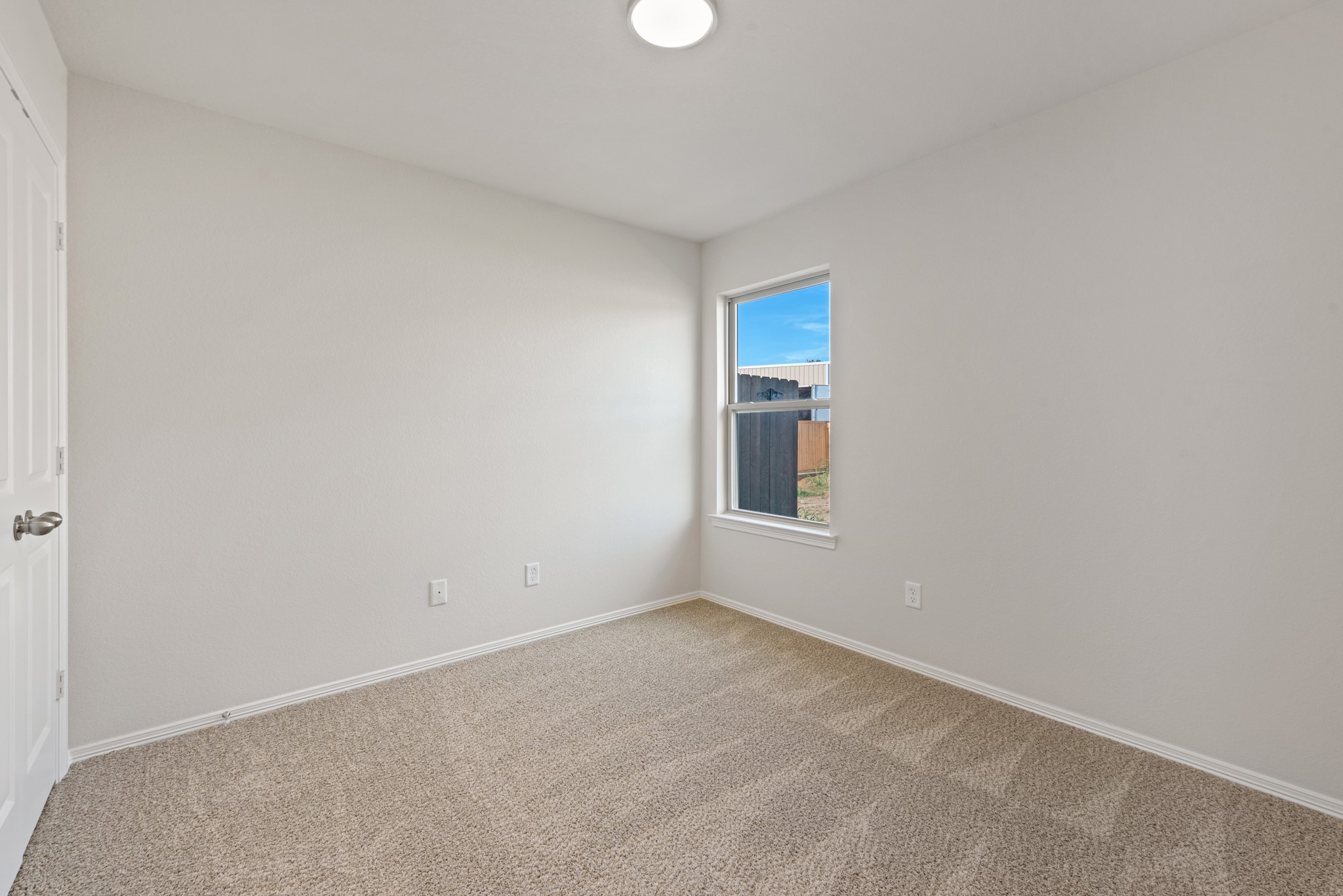 1215 High Street Navasota, TX 77868 - Photo 22 of 23 a view of an empty room with a window