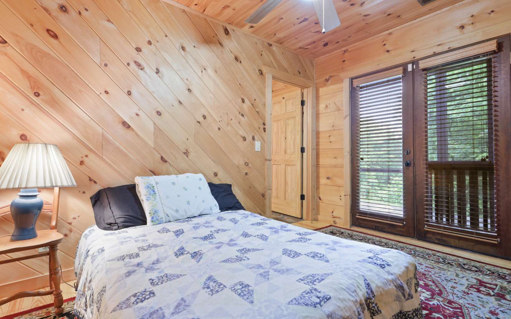 142 Abercrombie Road Suches, GA 30572 - Photo 20 of 29 a bedroom with a bed and a window