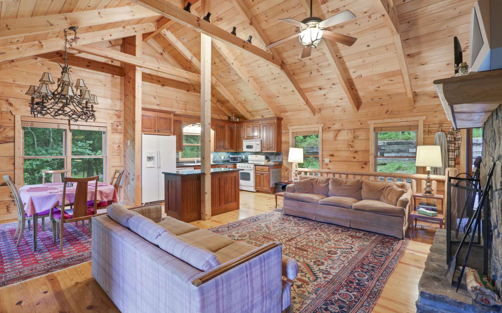 142 Abercrombie Road Suches, GA 30572 - Photo 5 of 29 a living room with furniture and a floor to ceiling window