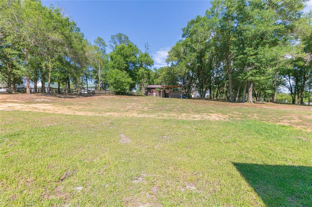 35369 Ruffing Road Dade City, FL 33523 - Photo 45 of 63 a view of an outdoor space and swimming pool