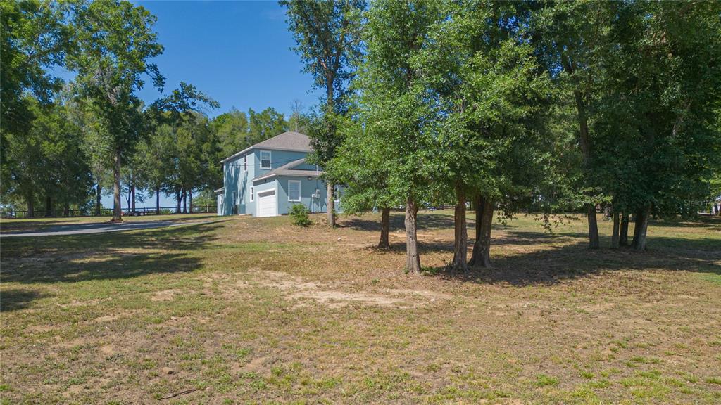 35369 Ruffing Road Dade City, FL 33523 - Photo 48 of 63 a house with trees in the background