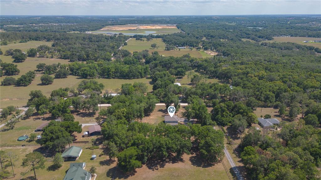35369 Ruffing Road Dade City, FL 33523 - Photo 56 of 63 an aerial view of a city with lots of residential buildings
