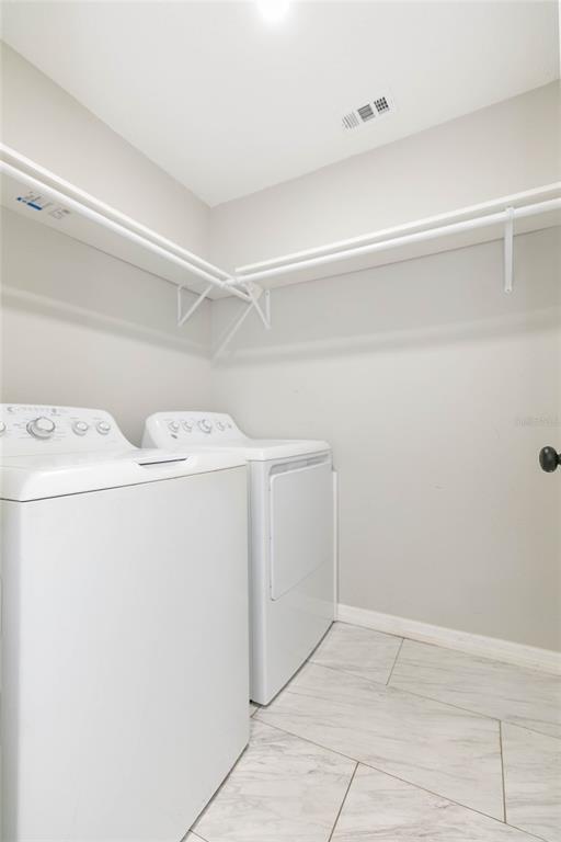 35369 Ruffing Road Dade City, FL 33523 - Photo 8 of 63 a utility room with dryer and washer