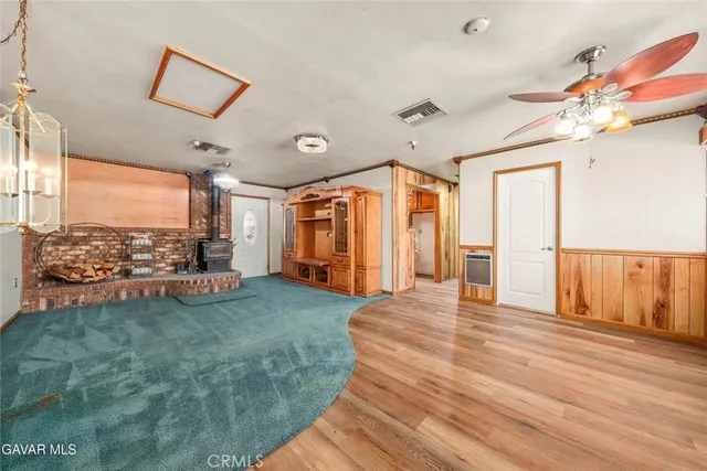 a view of a house with a yard and garage