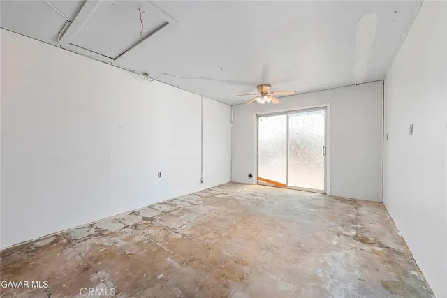 a kitchen with stainless steel appliances granite countertop a sink and a microwave