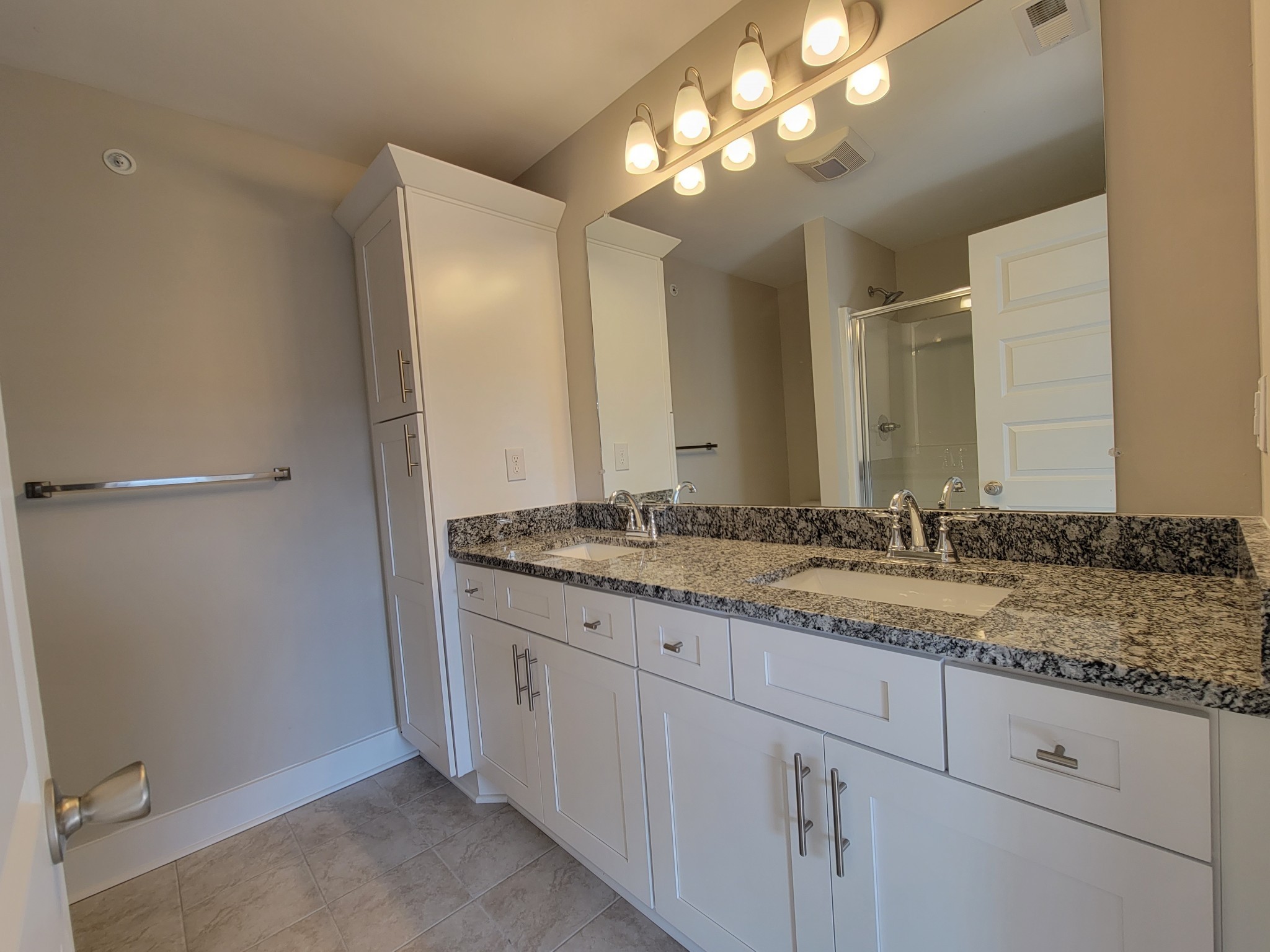 4011 Angelica Ct Spring Hill Spring Hill, TN 37174 - Photo 10 of 15 a bathroom with a granite countertop sink and a mirror