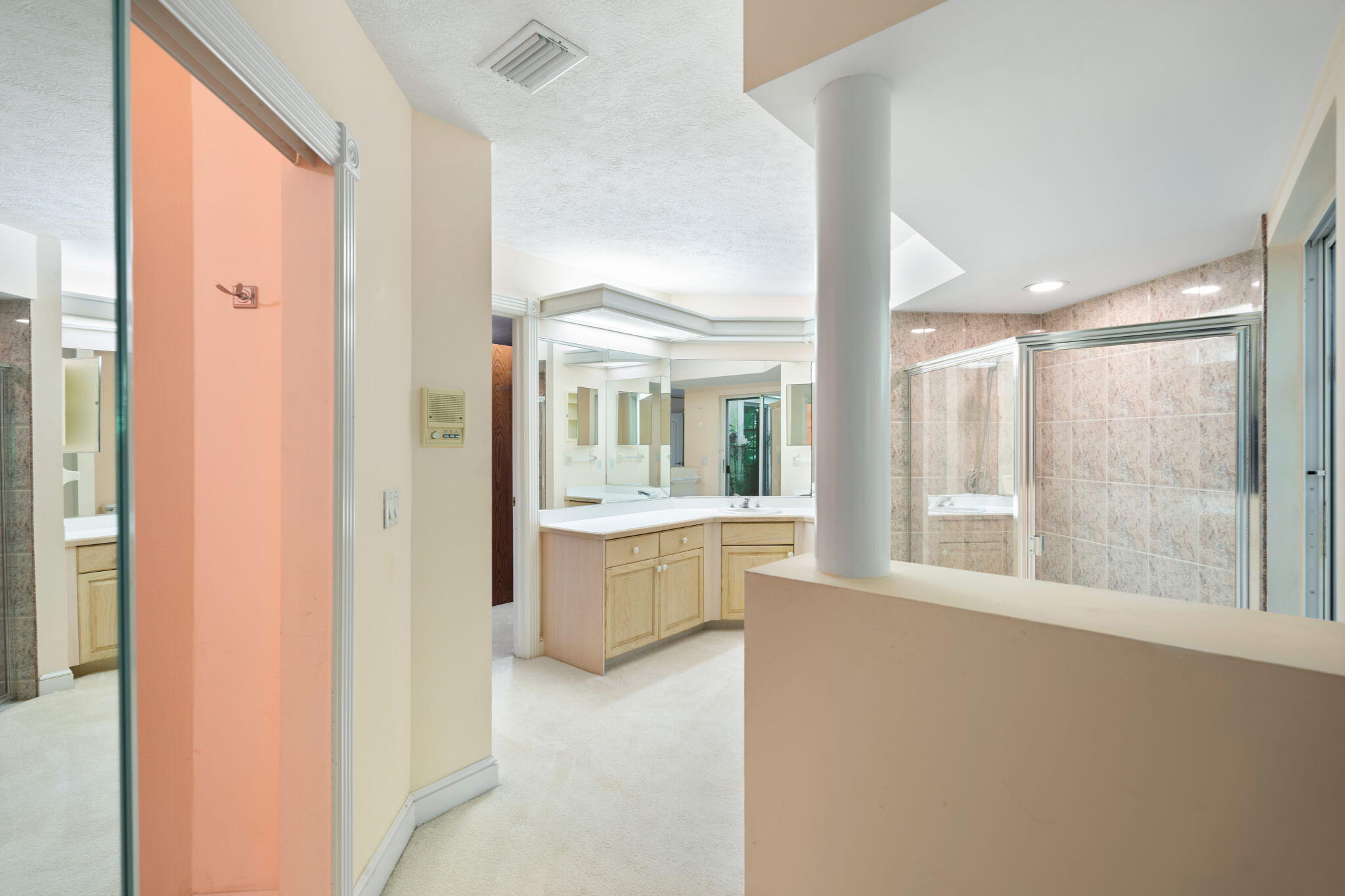 6 Castle Hill Way Sewall's Point, FL 34996 - Photo 12 of 31 a large white kitchen with granite countertop a sink and dishwasher with a large window