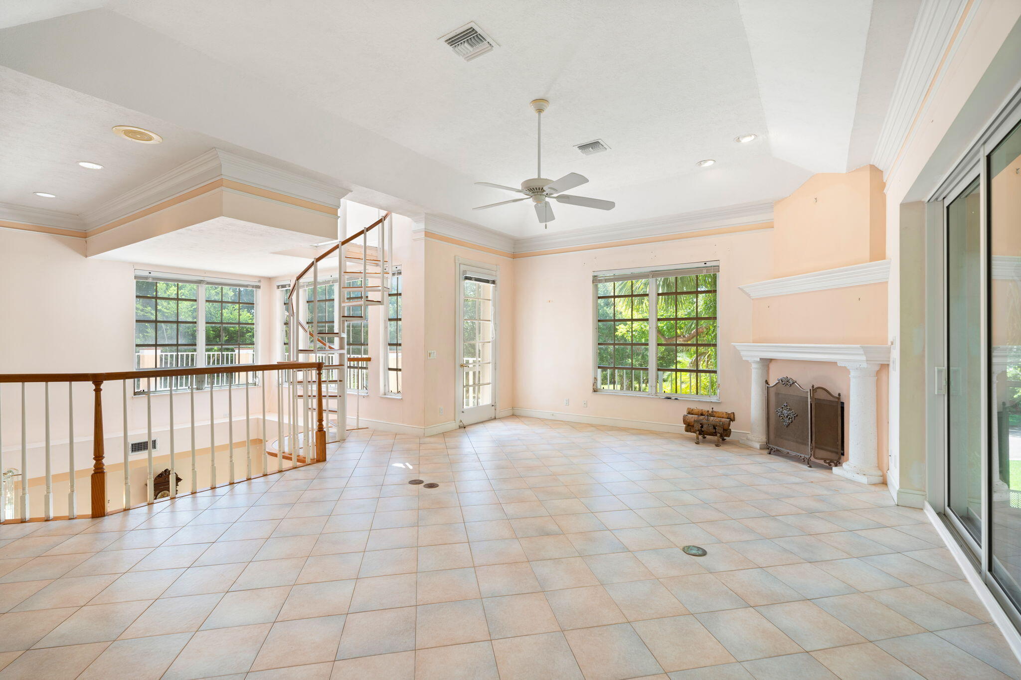 6 Castle Hill Way Sewall's Point, FL 34996 - Photo 16 of 31 a view of an empty room with a fireplace and a window