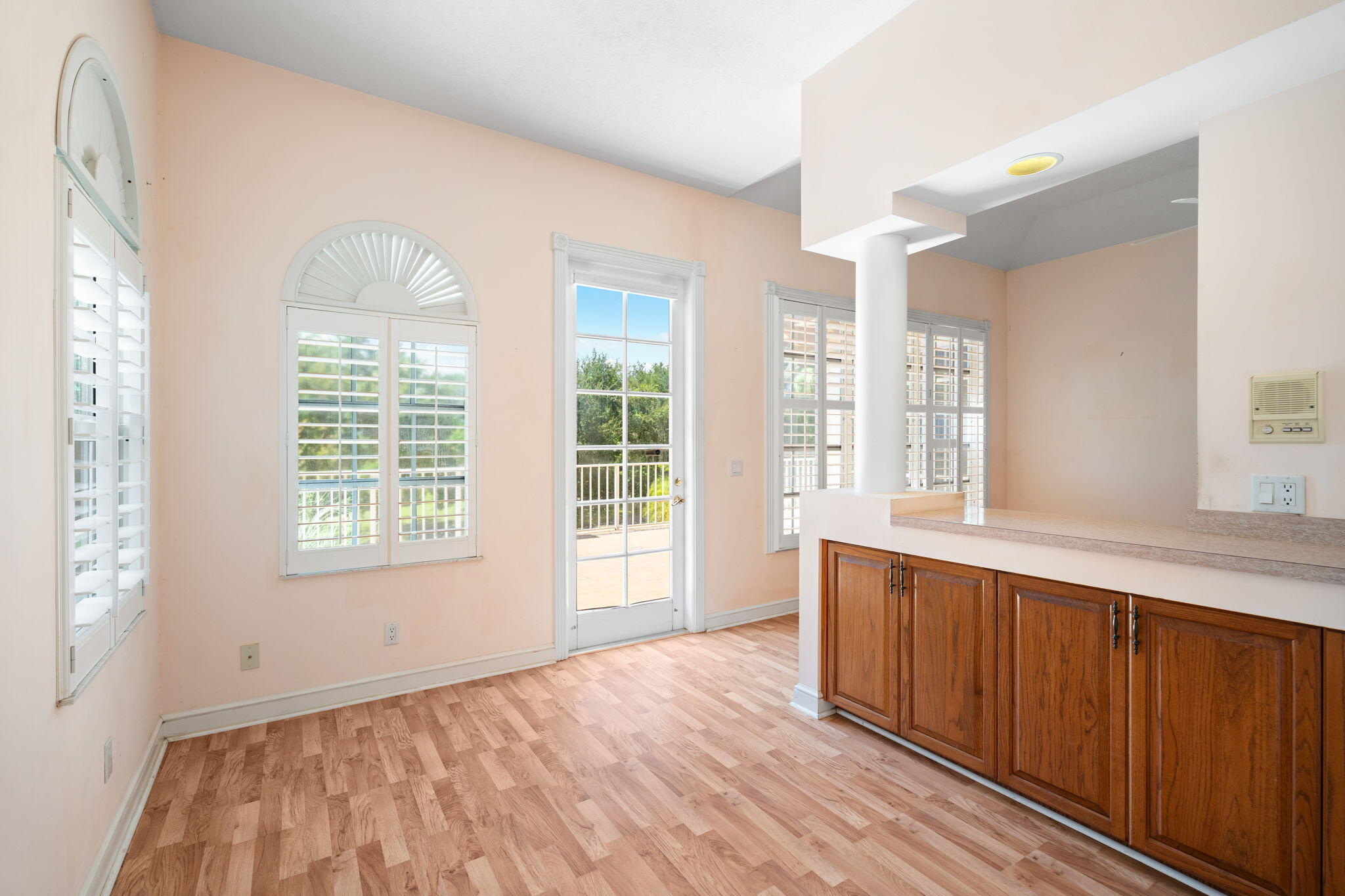 6 Castle Hill Way Sewall's Point, FL 34996 - Photo 24 of 31 a view of an empty room with wooden floor and a window