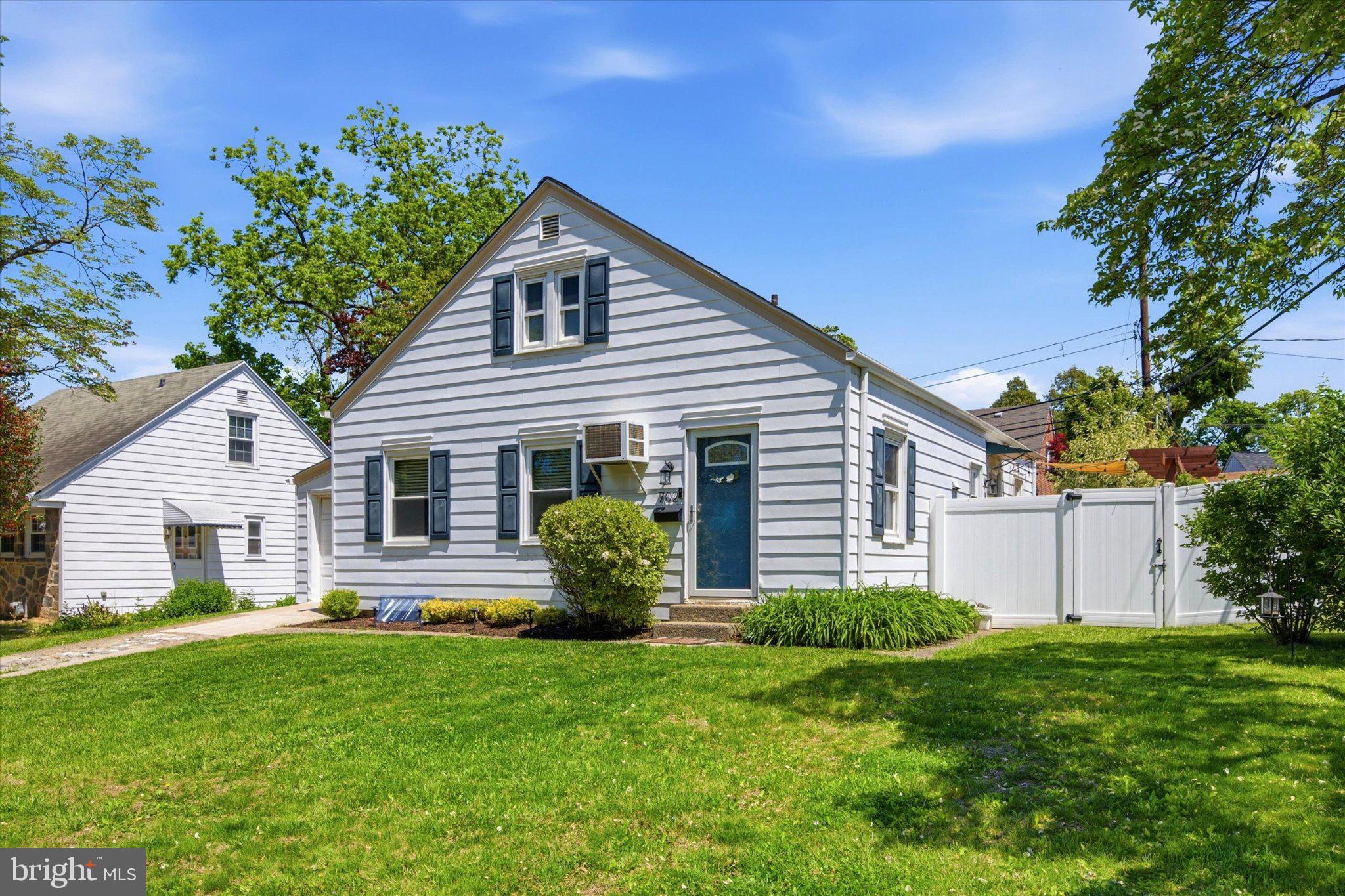 702 Hood Road Swarthmore, PA 19081 - Photo 3 of 35 Charming home with lush green yard.
