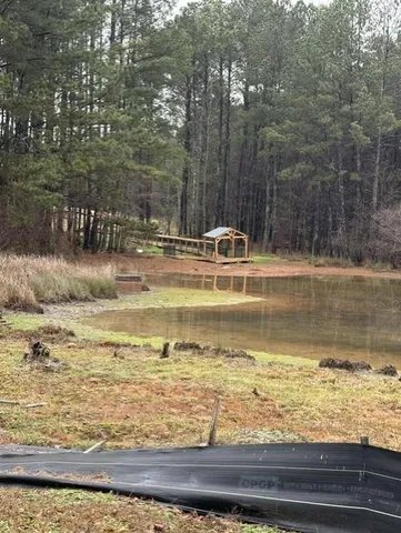 a view of a swimming pool with an outdoor space