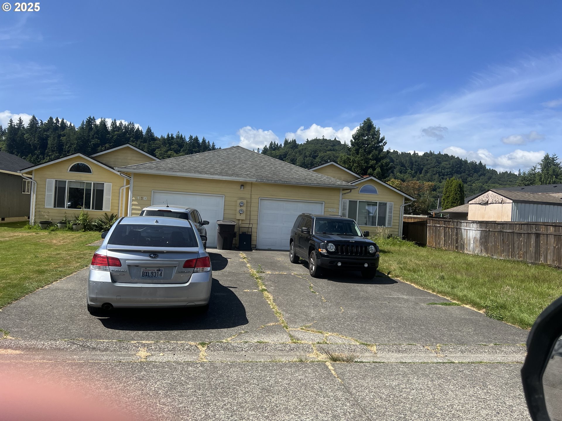 108 Cowan Court Longview, WA 98632 - Photo 1 of 1 a car parked in front of a house
