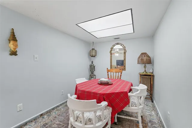 a view of a dining room with furniture