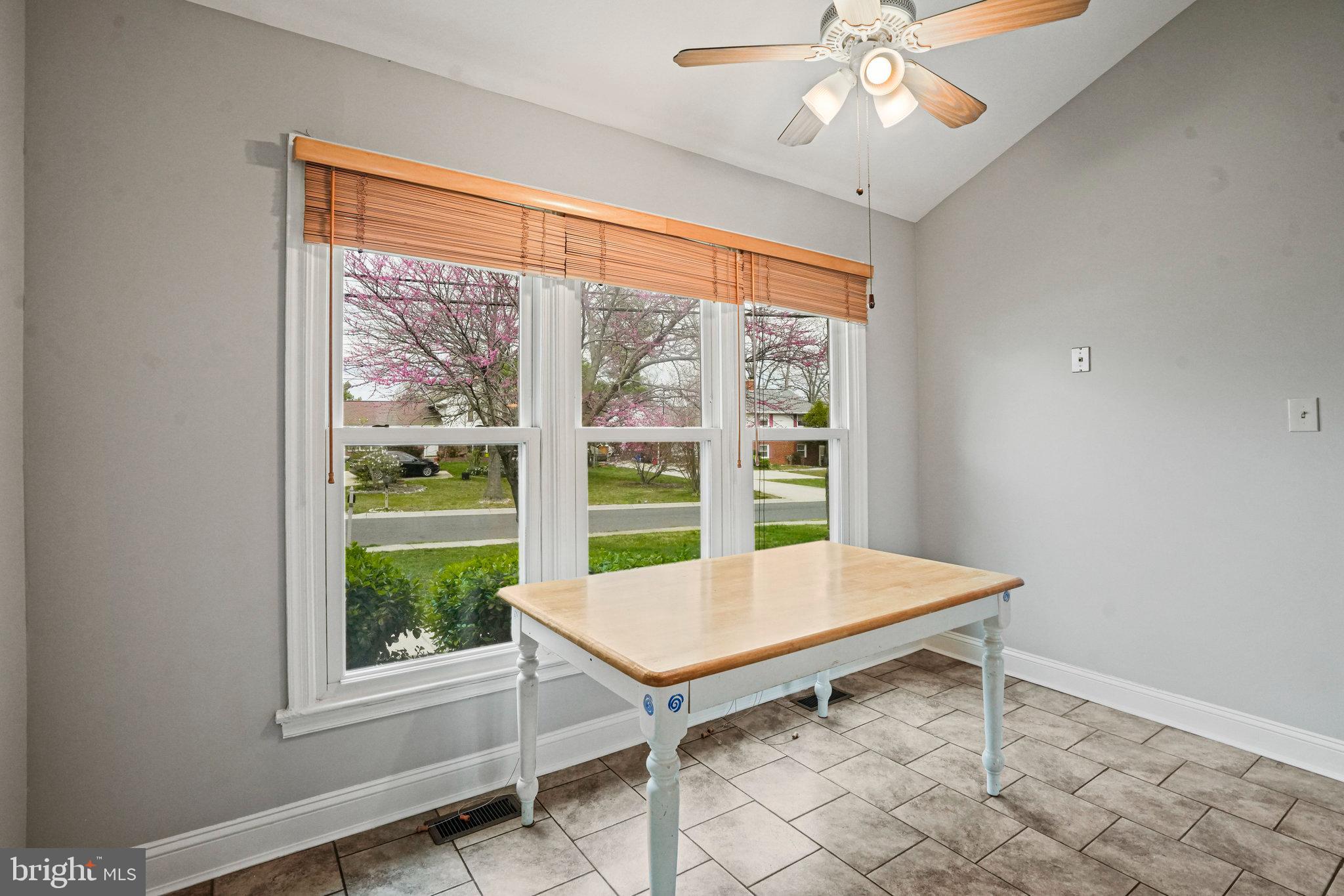 2913 Gracefield Road Silver Spring, MD 20904 - Photo 16 of 53 a living room with a table and a window