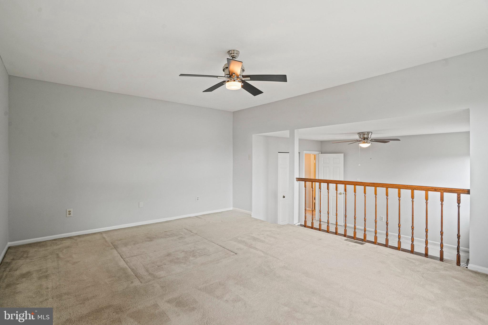 2913 Gracefield Road Silver Spring, MD 20904 - Photo 29 of 53 a view of a livingroom with a ceiling fan and window