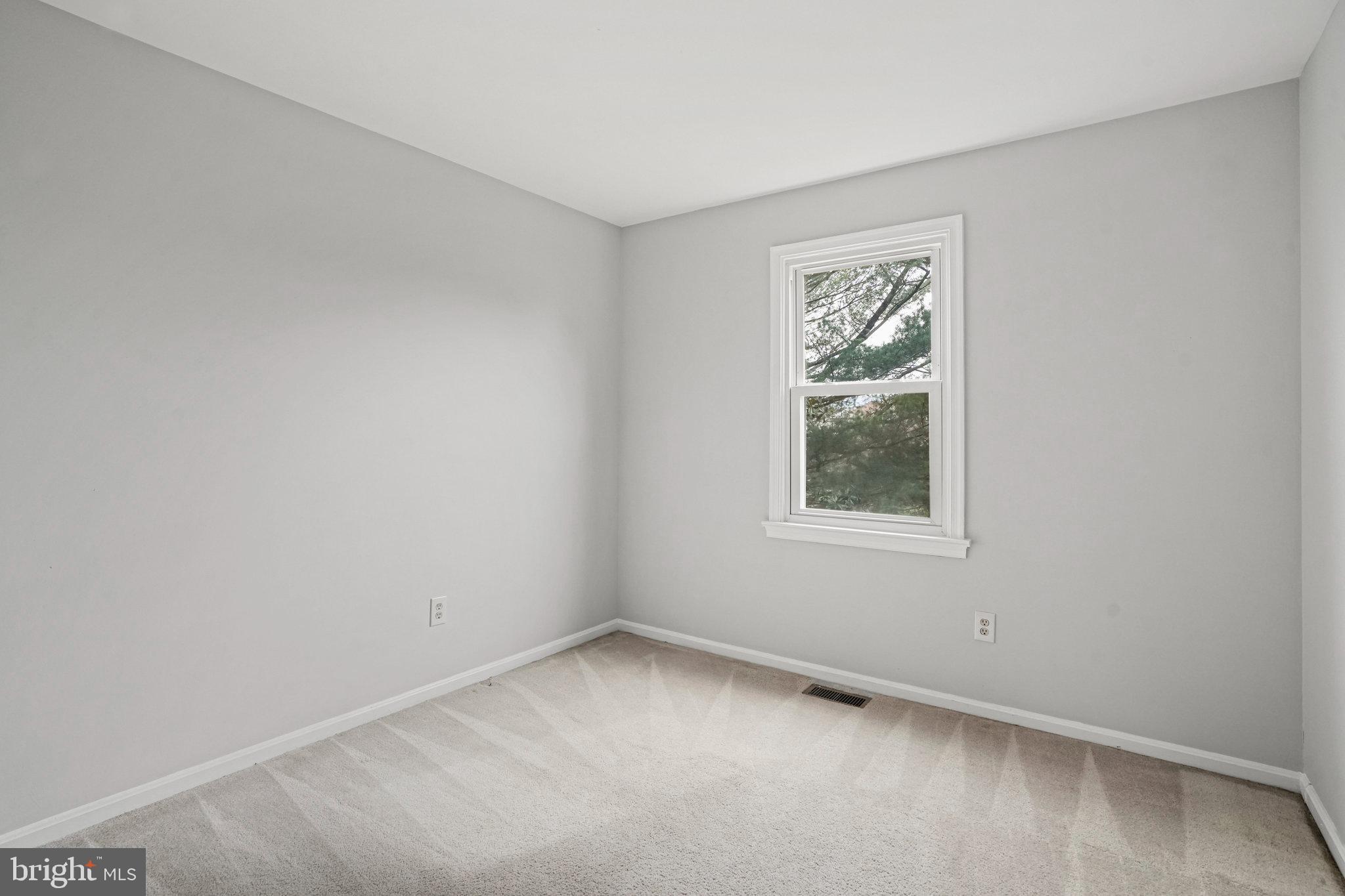 2913 Gracefield Road Silver Spring, MD 20904 - Photo 34 of 53 an empty room with a window