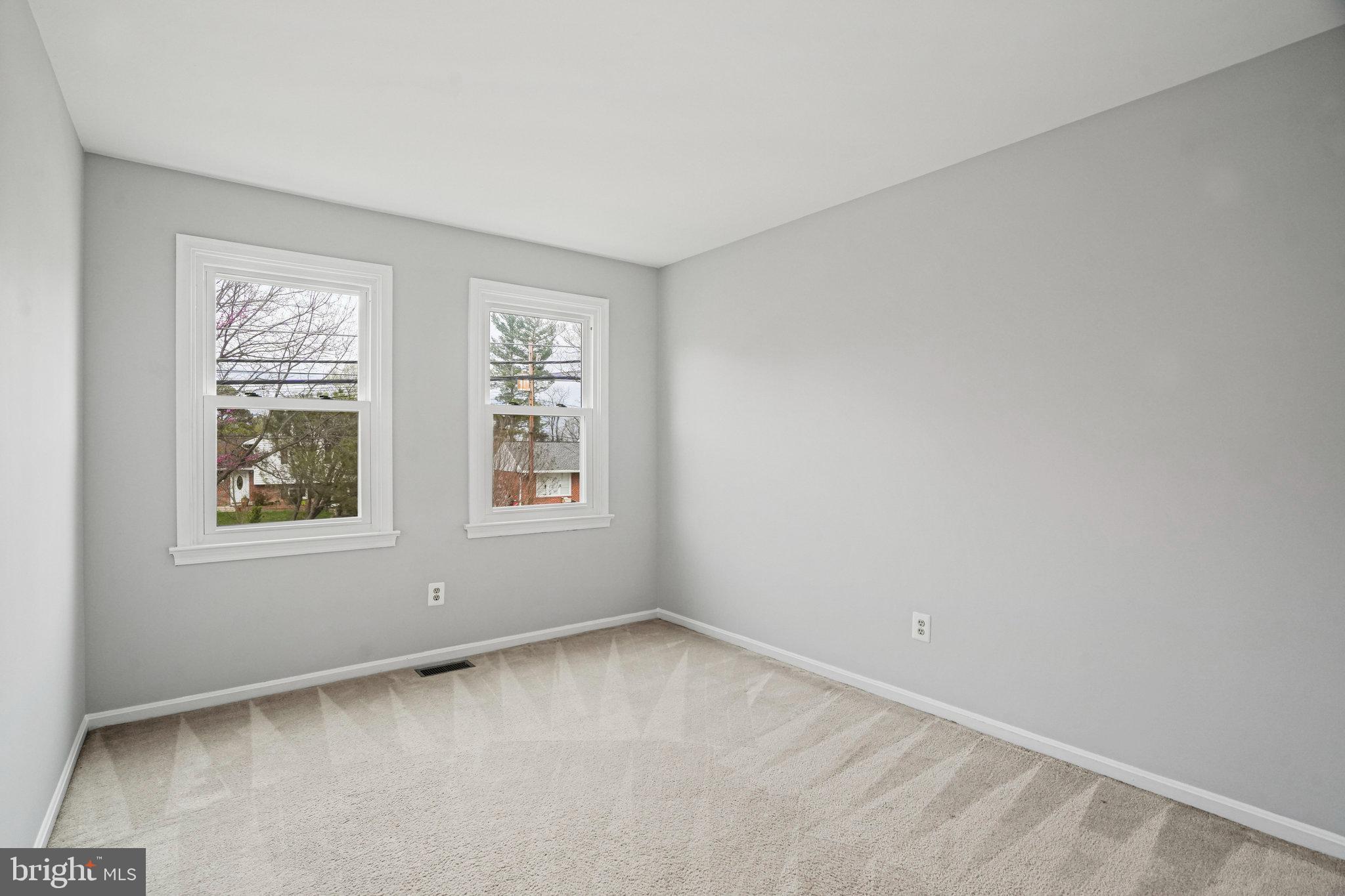 2913 Gracefield Road Silver Spring, MD 20904 - Photo 37 of 53 an empty room with a window