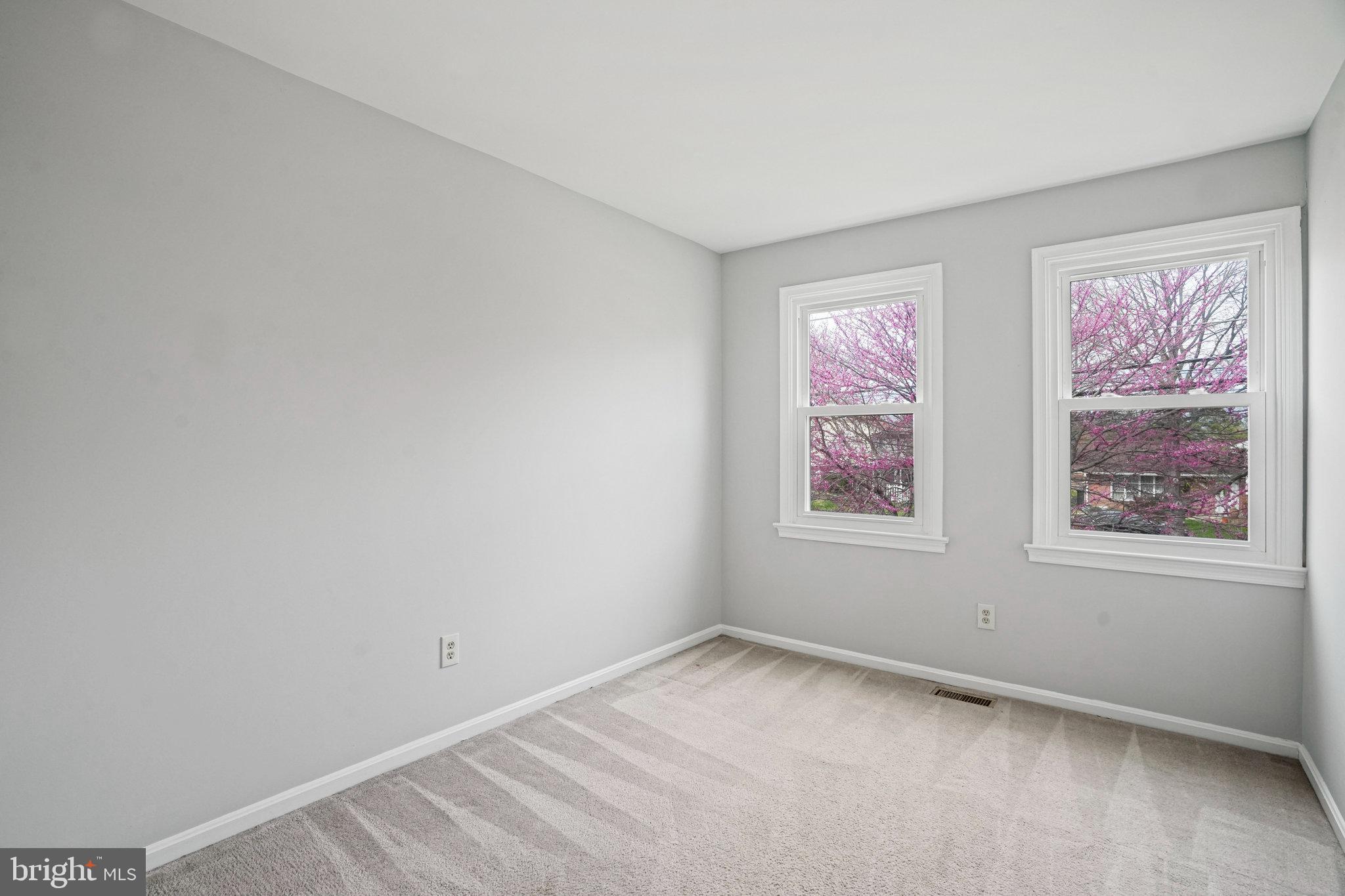 2913 Gracefield Road Silver Spring, MD 20904 - Photo 39 of 53 an empty room with windows