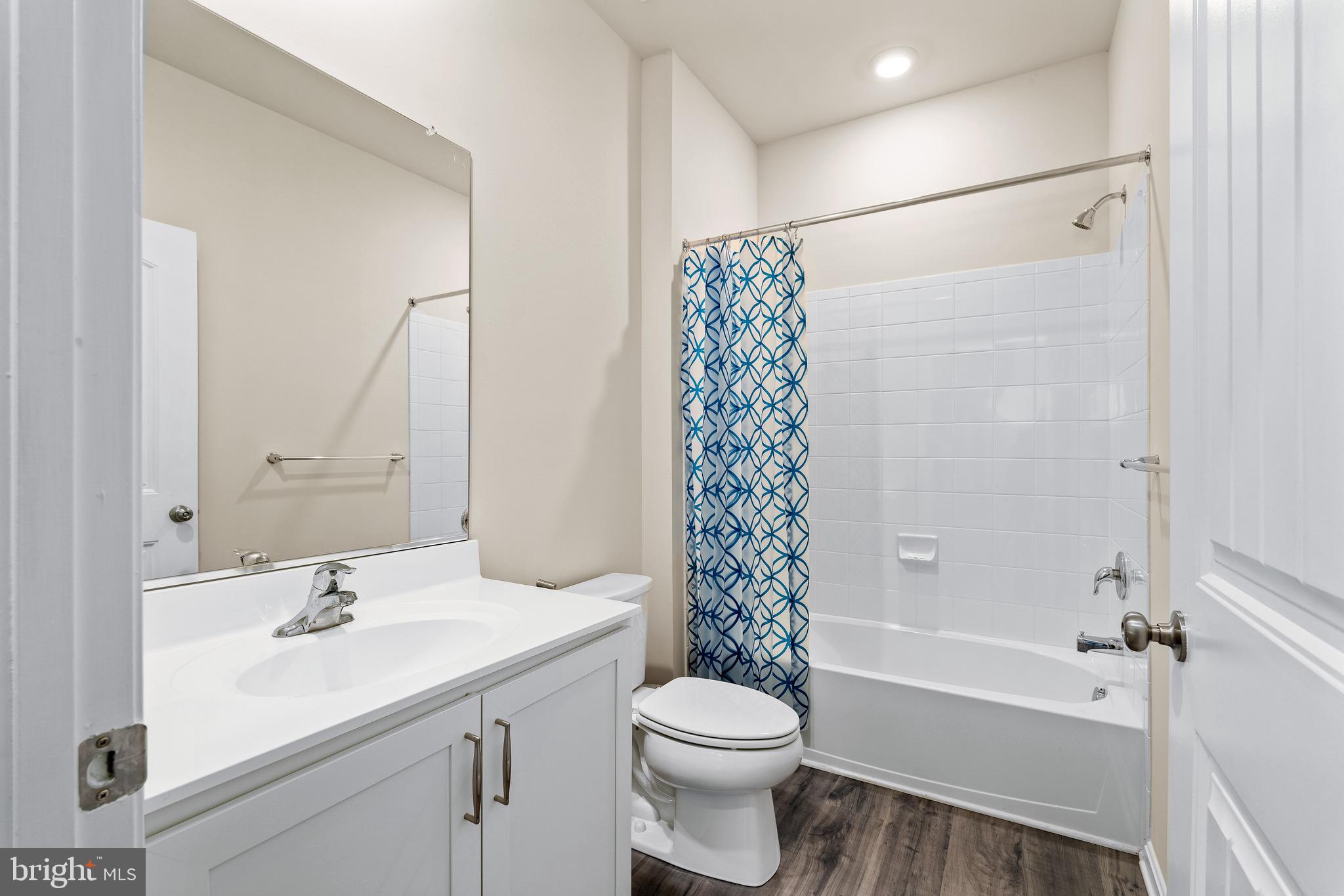 1268 Pimpernell Path Middletown, DE 19709 - Photo 18 of 51 a bathroom with a sink a toilet and a bathtub