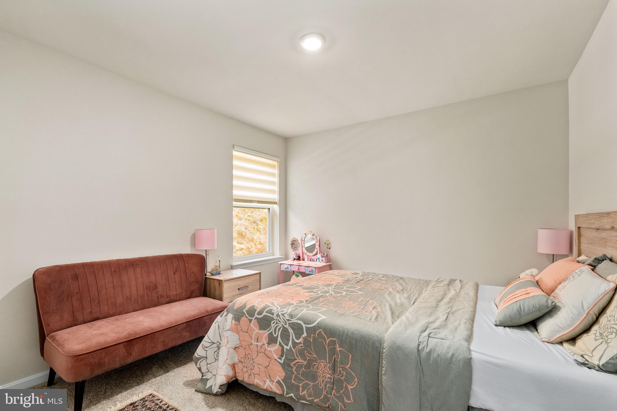1268 Pimpernell Path Middletown, DE 19709 - Photo 27 of 51 a bedroom with a bed and window