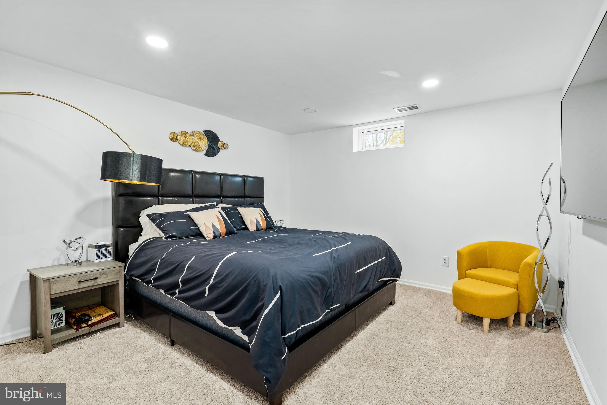 1268 Pimpernell Path Middletown, DE 19709 - Photo 32 of 51 a bedroom with a bed and a couch