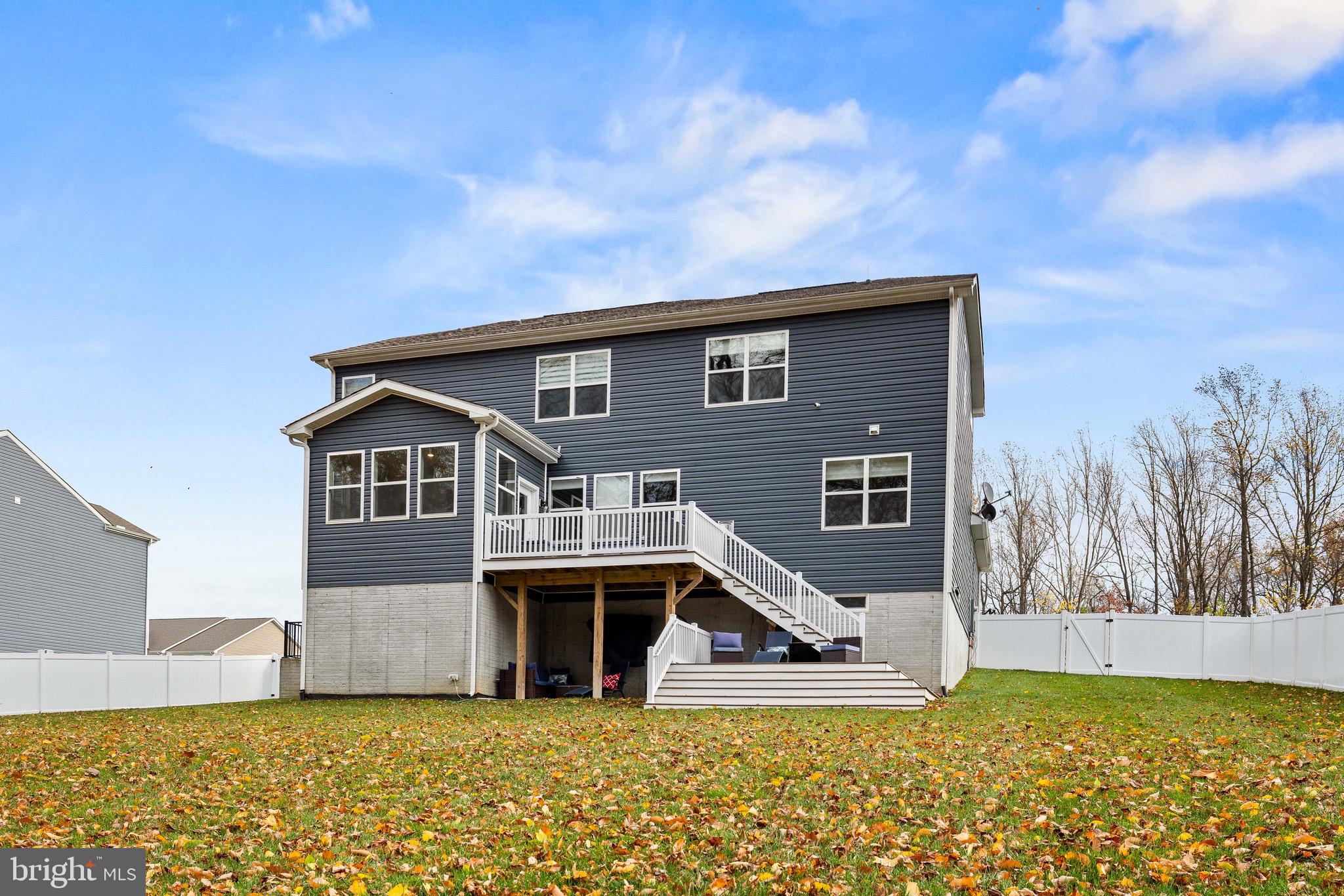 1268 Pimpernell Path Middletown, DE 19709 - Photo 42 of 51 a front view of a house with a yard